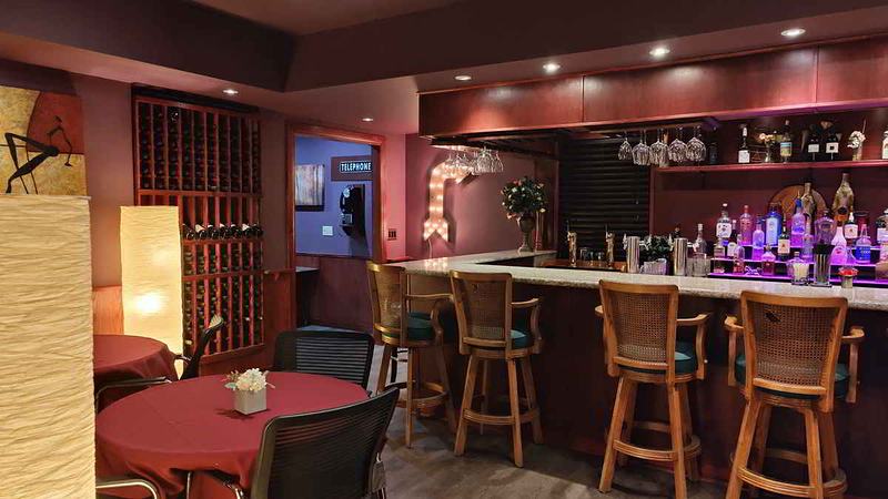 view of the bar left side seating option