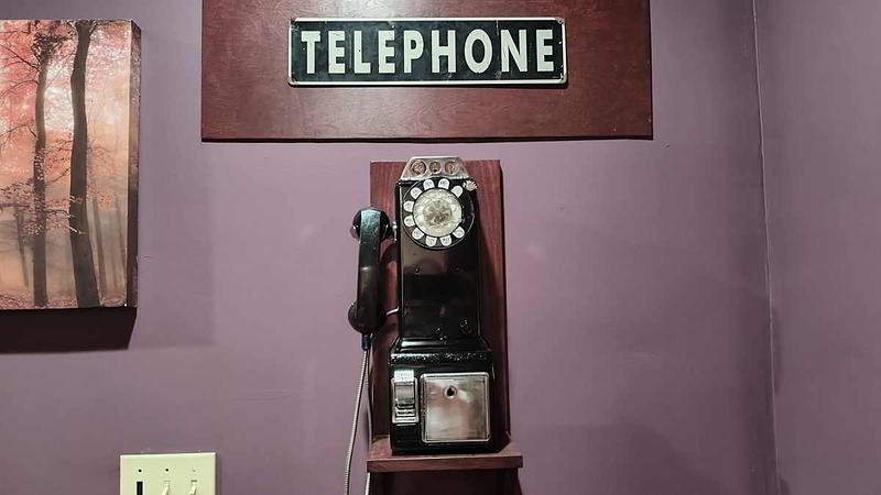 View of the rotary payphone in the bar area