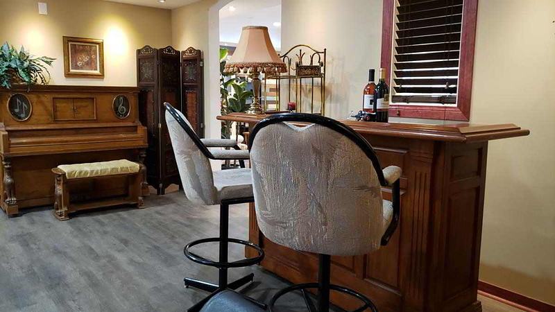 Home bar with the piano in the background