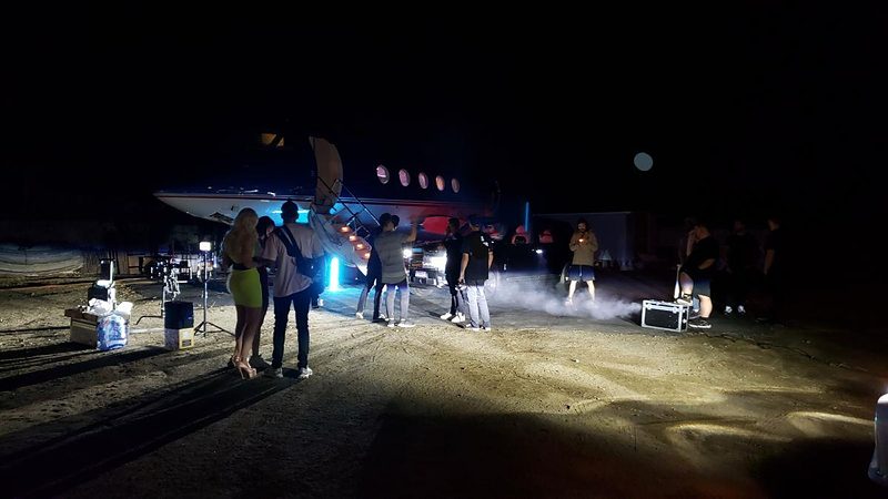 Night music video shoot on the private jet set