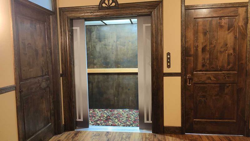 Vintage elevator set with decorative doors