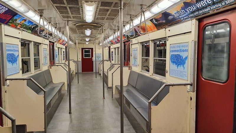 Subway car interior with bench seating