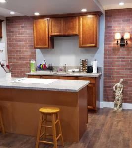 link to apartment kitchen with brick set