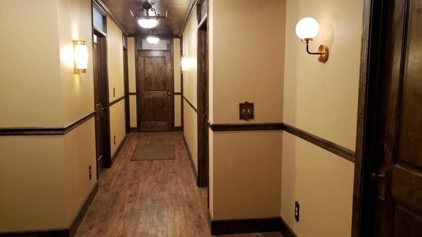 wood ceilings over a vintage office hallway filming location
