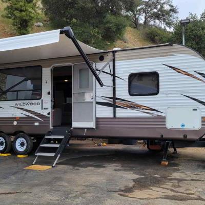 Very clean and spacious 33 foot camper trailer can be used as a filming location or as a dressing or holding room for your talent. Equipped with refriderator, air conditioning, bathroom and shower.