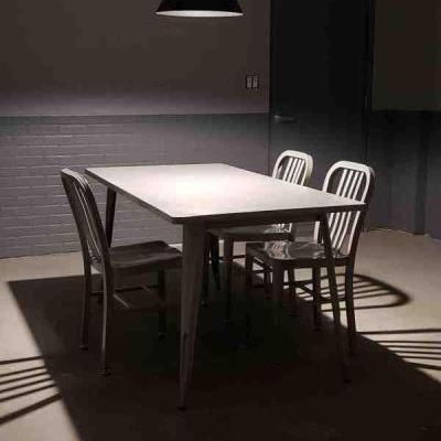 spotlight over a police interrogation table filming location